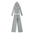 Dames grijze slim-fit hoodie met rits en wijde broek tweedelig pak vooraanzicht - S / Boven- En Onderstuk / Lichtgrijs