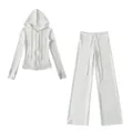 Detailed view of white warm yoga set featuring slim hoodie and wide-leg pants - Off-white Set