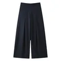 Elegant high-waisted pinstripe wide-leg trousers for women with a draping detail. - Fine Blue Striped