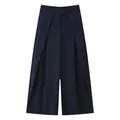 Navy blue pinstriped wide-leg trousers with front pleats and draped fabric for women - Blue Stripe