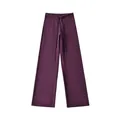 Detailweergave van paarse yoga broek met wijde pijpen en trekkoord in de taille - S / Bottoms / Donkerpaars
