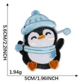 Detailed cute cartoon penguin embroidery patch with dimensions 5.6x5cm and weight 1.94g - Penguin with Blue Scarf and Hat (1) / Self-Adhesive (5.6x5cm)
