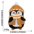 Cute penguin embroidered patch for clothing with dimensions 5.5x3.5cm and 1.65g weight - Penguin with Orange Scarf and Hat (2) / Self-Adhesive (5.5x3.5cm)