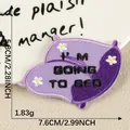 Purple pillow-shaped embroidery patch with I'M GOING TO BED text and white flowers - Purple Bedtime Style (2026.6.27) / Hot Melt Adhesive