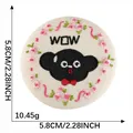 Detailed 5.8cm round embroidered patch featuring a black cartoon character and pink flowers - WOW Black Silhouette Pink Flower (Style 12)