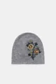 Close-up detail of gray knitted beanie with elegant floral embroidery and beads. - Beaded Hat