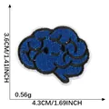 Blue brain embroidered iron-on patch measuring 4.3x3.6cm for DIY clothing decoration - Brain Pattern / Hot Melt Adhesive Single Piece