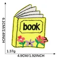 Yellow cartoon book embroidery patch with floral design for DIY clothing decoration - Yellow Book (book) / Hot Melt Adhesive Backing