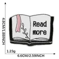 Embroidered book patch with Read more text, dimensions 6.6x4.8cm, 1.23g weight. - White Book (Read more)