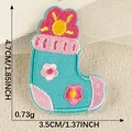 Cute embroidered sock patch with floral pattern and size measurements in pink and teal - Blue Sock Shape Style (2026.4.21) / 1 Piece/Pack (4.7x3.5cm)