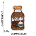 Detailed brown drink bottle iron-on embroidery patch, measuring 2.7x1.5cm for DIY craft - Brown Coffee Bottle (3)