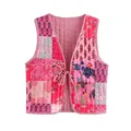 Felroze gebloemde patchwork gewatteerde omkeerbare bodywarmer voor dames trendy - S / Tops / Color-blocked Print