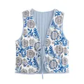 Reversible quilted vest for women featuring blue floral print and striped lining - Gray Blue Print