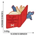 Cartoon book embroidery patch with blue tentacles and evil knowledge text - The Book of Unspeakable Evil Knowledge