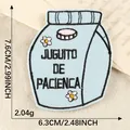 Lichtblauw geborduurde sapverpakking patch met Spaanse Juguito de Paciencia tekst - 7.6x6.3cm