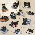Set di toppe ricamate a forma di gatto nero cartoon per decorazione vestiti DIY - Confezione da 12