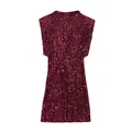 Close-up detail of a wine red sleeveless sequin dress with padded shoulders design. - XS / Dresses / Burgundy