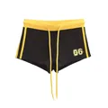 Sportieve retro hotpants voor dames in zwart met gele accenten en 06-opdruk - S / Bottoms / Zwart