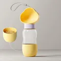 Tragbare gelbe Haustier-Wasser- und Futterflasche mit wolkenförmigem Trinknapf und Band - 2-in-1 Wasser- und Futterspender / 350ml+200ml / Gelb