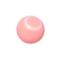 Gros plan d'une balle de chat rose intelligente à gravité avec surface texturée et bouton - Balle Roulante / Rose / Pour Chats