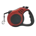 Portable red and black retractable dog leash featuring a bone print design for pets - 3m Bagged / Red