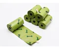 Groene biologisch afbreekbare hondenpoepzakjes met bottenprint, rollen voor huisdieren - Botprint / 8 Rollen Pakket (Verpakt) / Groen