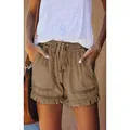 Close-up of khaki casual high-waist drawstring denim shorts with frayed fringe hem - XS / Bottoms / Khaki