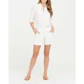 Women's white stretch twill canvas shorts paired with a matching white shirt outfit - White