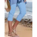 Hellblaue einfarbige Damen Capri Leggings in einer Strand Lifestyle Umgebung - S / Unterteile / Hellblau