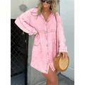 Detail view of pink acid-wash denim V-neck shirt dress featuring a relaxed oversized fit - 2XL / Dresses / Pink