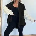 Oversized schwarze Jeansjacke mit weißen Zopfstrickärmeln für Damen, SKO-Variante - S / Oberteile / Schwarz