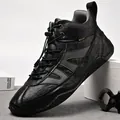 Black high-top leather Martin boots for men featuring textured finish and toggle laces. - 38 / Black