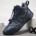 Durable blue high-top men's leather boots featuring octopus-style anti-slip rubber sole - 38 / Blue