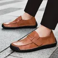 Men's handmade brown leather driving loafers featuring a soft sole and stitching details - 38 / Red Brown
