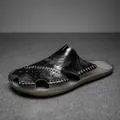 Stylish men's black genuine leather closed-toe hollow sandals for summer beach wear - 38 / Black