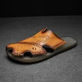 Men's brown genuine leather closed-toe sandals featuring an embossed feather pattern detail - 38 / Tan