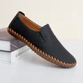 Black hand-stitched men's casual loafers featuring soft soles and a slip-on design - 38 / Black