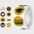 Detail view of round graduation stickers roll with gold and black congrats designs - Graduation Series (C103) / 2.5cm (500 Pieces/Pack)