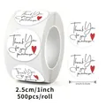 Macro detail of 1-inch circular Thank You stickers roll featuring red heart design - Thank You For Your Purchase (C20) / 500 Stickers/Roll / 25mm