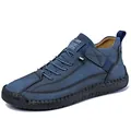 Men's mid-top casual blue leather boots featuring elastic laces and velcro strap closure - 38 / Blue
