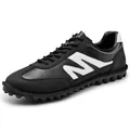 Retro black leather men's sneakers with soft rubber sole and white 'M' side logo - 38 / Black