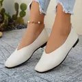 Minimalist women's retro flat shoes in cream pebbled leather with stylish V-cut design - Beige