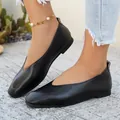 Elegant black women's retro leather flats with pebbled texture and V-cut vamp design - Black