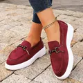 Close-up of burgundy faux suede platform loafers featuring a stylish metal buckle detail - 36 / Loafer Style / Burgundy