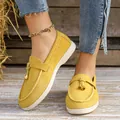Yellow slip-on loafers for women with decorative metal charms and white sole - 38 / Yellow