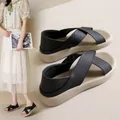 Lightweight black cross-strap sandals for women with comfortable flat beige sole - 35 / Black