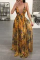 Deep V-neck floral chiffon maxi dress with backless design in a living room setting - S / Dresses / Orange
