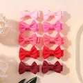 Set of ten mini grosgrain ribbon bow hair clips in shades of pink and red for little girls - 10D Style