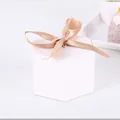 Elegant white hexagonal gift box with a champagne silk ribbon bow detail for favors - White