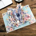 Elegant 3D pop-up greeting card featuring blue butterflies and floral designs on wood - Dreamy Blue Butterfly